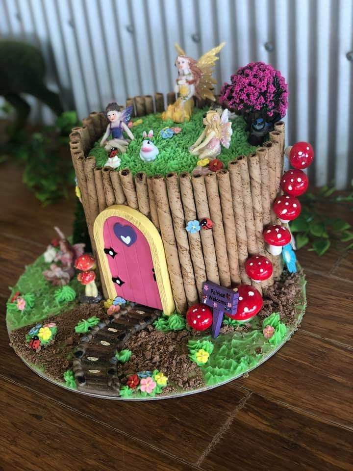 Whimsical cake made to look like a fairies home and garden Fairy Garden